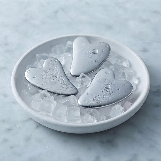 Calmiri stainless steel heart gua sha chilled on ice